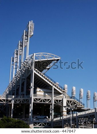 Section of baseball stadium with light towers