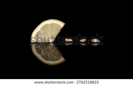 section of Lemon and pips reflection on black background