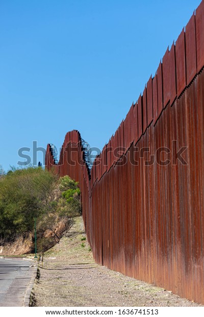 Section of the United States border wall with\
Mexico from Nogales\
Sonora