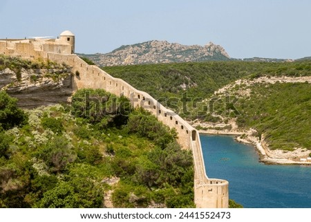 A section of the wall of the Citadel of Bonifacio perched on rugged cliffs, Bonifacio, Corsica, France, Mediterranean, Europe