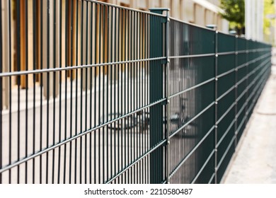 Sectional Metal Mesh Fence. Steel Grating Fence. Sectional Fencing Installation. 