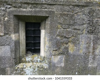 sections or parts of a old church wall and Window