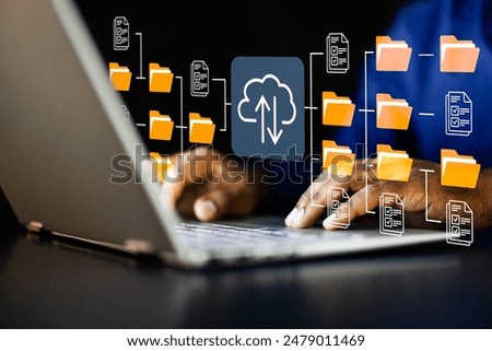 Secure Cloud Server Access: African-American IT Consultant Managing Online File Storage for Data Analysis and Document Archiving Services.
