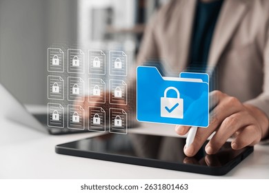 Secure data management concept with businessman using tablet. Locked digital folder and documents represent cybersecurity, file protection, privacy policy, and safe information storage.