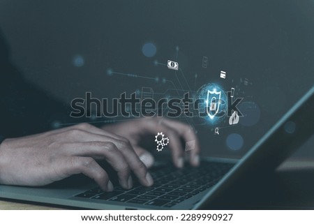 Secure data technology. Cyber security and privacy on internet network concept. Information and blockchain data protection. Businessman working with computer laptop and virtual safeguard on screen.