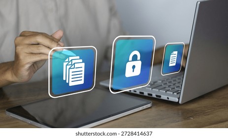 Secure digital document management system being accessed by a professional using a tablet and laptop. The image features high-quality 3D holographic icons representing file folders, a security padlock for data encryption, and individual digital documents. This visual highlights modern cybersecurity measures, cloud storage solutions, and efficient electronic filing workflows in a corporate or home office environment. It perfectly illustrates concepts of information privacy, paperless office transitions, and advanced network security protocols used to protect sensitive corporate data - Powered by Shutterstock - Get 15% off with code: PIKWIZARD15