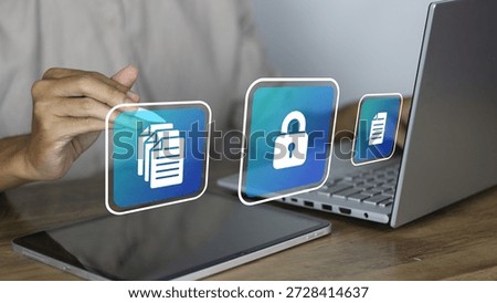 Secure digital document management system being accessed by a professional using a tablet and laptop. The image features high-quality 3D holographic icons representing file folders, a security padlock for data encryption, and individual digital documents. This visual highlights modern cybersecurity measures, cloud storage solutions, and efficient electronic filing workflows in a corporate or home office environment. It perfectly illustrates concepts of information privacy, paperless office transitions, and advanced network security protocols used to protect sensitive corporate data