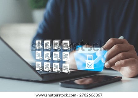 Secure document, data management concept. Businessman using laptop and tablet. Locked digital folder and documents represent cyber security, file protection, privacy policy, safe information storage.