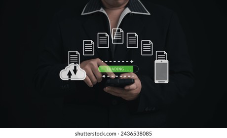 Secure Encryption File Transfer or Cybersecurity in Business : Businessman Using Laptop and Mobile for Remote Download and Upload of Documents in the Cyber World with Cloud-Based Data Security - Powered by Shutterstock