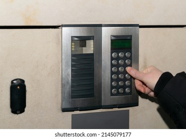 Secure Home System. Hand Pressing On Intercom Keypad, Using Door Phone, Doorphone, Entryphone, Videophone Call