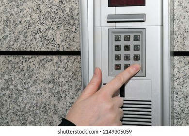 Secure Home System. Hand Pressing On Intercom Keypad, Using Door Phone, Doorphone, Entryphone, Videophone Call