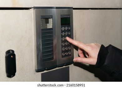 Secure Home System. Hand Pressing On Intercom Keypad, Using Door Phone, Doorphone, Entryphone, Videophone Call