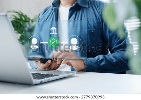 Secure Mobile Banking Transaction Interface with Digital Payment Protection Overlay on Smartphone User in Modern Workspace Showing Online Financial Transfer Security and Fintech Authentication Concept