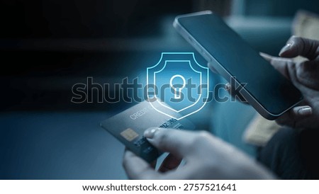Secure online payment using credit card and smartphone with cybersecurity shield icon. Concept of financial data protection, secure checkout verification, encryption technology, and digital banking.