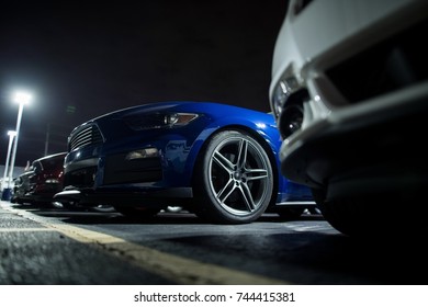 Secure Overnight Car Parking. Modern Vehicles On The Parking Lot At Night.