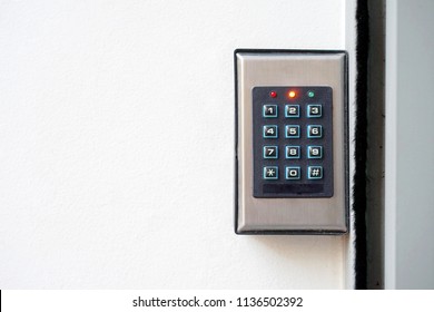 Secure Password On Keyboard For Opening Home House Door. Password Code Security Keypad System Protected In Public Building. The Security Code Combination To Unlock The Door