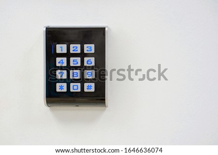 Secure password on keyboard for opening home house door. Password code Security keypad system protected in public building. Security code combination to unlock the door.                            