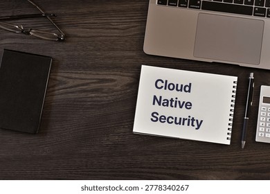 Secure technology and Cloud Native Security on notebook with laptop, glasses, calculator. Cyber security, protection and digital trust.