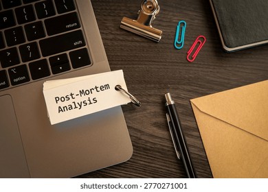Secure technology and Post-Mortem Analysis on word card with clips, laptop, pen. Cyber security, protection and digital trust.