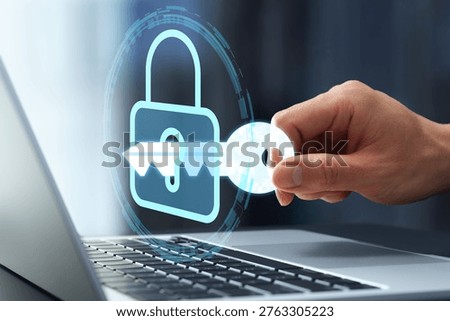 Secure user authentication and network access control. Security system and encryption key. Businessman using passkey for identity verification on laptop computer.