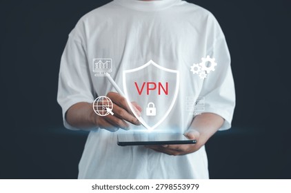Secure VPN technology concept with user holding tablet and digital shield interface, representing cybersecurity, encrypted connection, online privacy, network security and secure access.