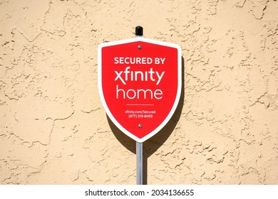 Secured By Xfinity Home Outdoor Yard Sign On Pole. - San Jose, California, USA - 2021