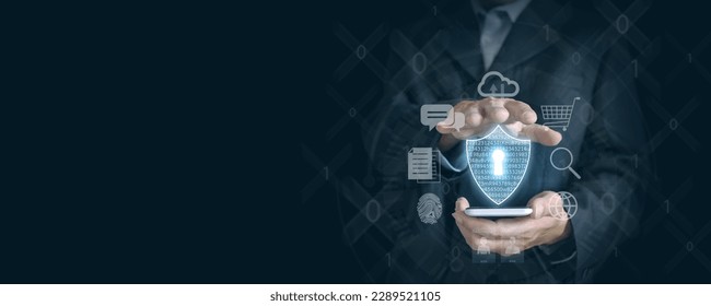 Securely Navigating the Digital World: Businessman's Hand Holds Smartphone with Virtual Shield Icon and Internet Icons for Protection.