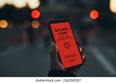 Security alert on smartphone screen. Antivirus warning. Private data protection system notification. Important security issue. Concept of cyber crime, hacking password and bank accounts - Shutterstock ID 2162245337