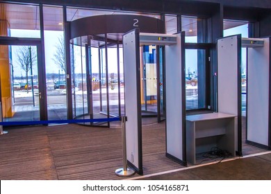 Security. Arched Metal Detectors. Checking People At The Entrance To The Building. Arch With A Metal Detector.