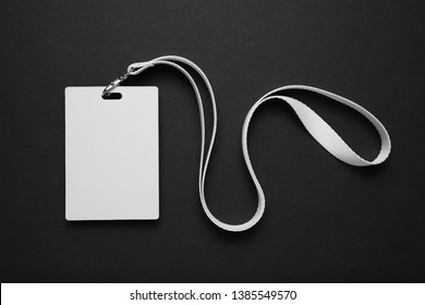 Security badge on black background, lanyard plastic clip, template. - Shutterstock ID 1385549570