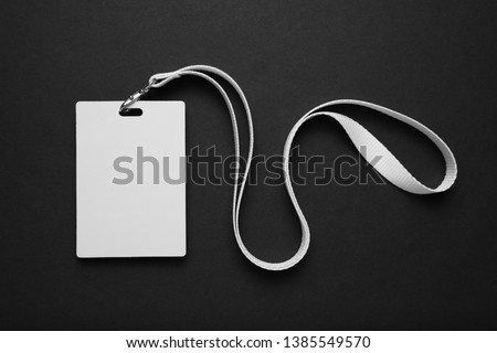Security badge on black background, lanyard plastic clip, template.
