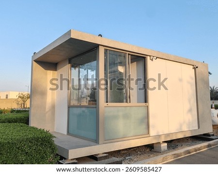 Security Booth Container with Glass Window on both side.
Security Eneterence Checking Control Point  Outdoor.
Full View Portable container House or Home Cabin having Gray color for control Traffic.