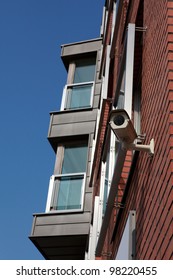 Security camera attached on building