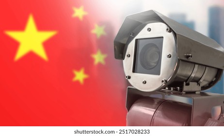 Security camera in China. CCTV in PRC. Flag of people republic of China. Outdoor camera in metal case. Anti-vandal CCTV equipment. Concept of big brother in China. City security camera