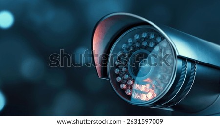 Security camera in a darkness with infrared sensor, we see it in close-up in blue colors