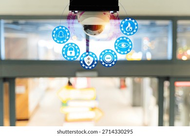 Security camera with digital interface icons showing surveillance, monitoring, alerts, and protection inside a modern building, representing smart technology, safety systems, and business security.