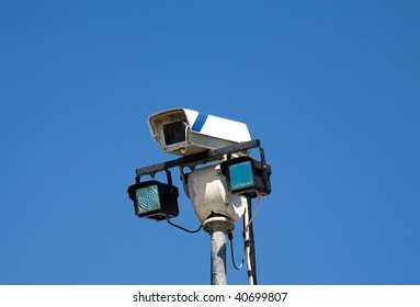 security camera on a blue background. Isolated object.