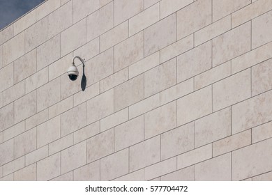 Security camera in stone wall