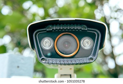 Security CCTV Camera. Multi-angle CCTV System on Green Nature Background.