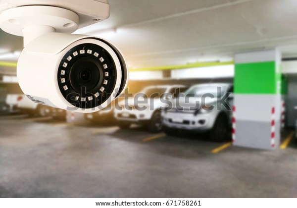 Security CCTV camera in office building\
installed indoor car\
park\
\
