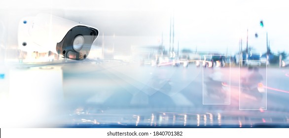 Security CCTV camera or surveillance system in road, Intelligent cameras can record video all day and night to keep you safe from. Closeup of traffic security camera surveillance (CCTV) on the road in