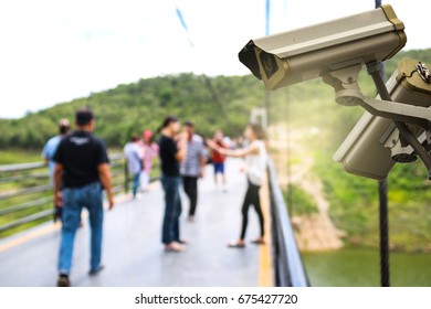 Security CCTV camera or surveillance system at suspension bridge.