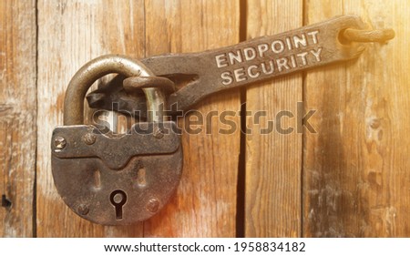 Security concept. There is a lock on the door on the metal part of which it is written - ENDPOINT SECURITY