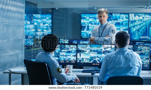 Security Control Room Chief Surveillance Officer Stock Photo