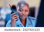 Security dispatch, police or woman with walkie talkie for communication to monitor CCTV or surveillance. Emergency radio, crime safety or guard listening to criminal problem, theft or crisis at night