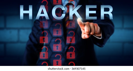 Security Expert Touching HACKER Onscreen. Broken Virtual Lock Icons In A Hexagon Matrix Are Lighting Up Red. Technology And Business Concept For Black Hat, White Hat And Blue Hat Hacking Activities.