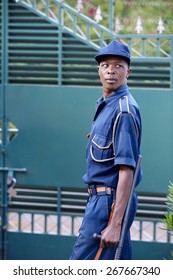 Security Guard Black, Guarding A Door