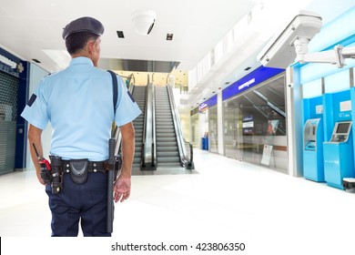 Security Guard And CCTV In The Elevator Lobby, ATM Banknote Office Building