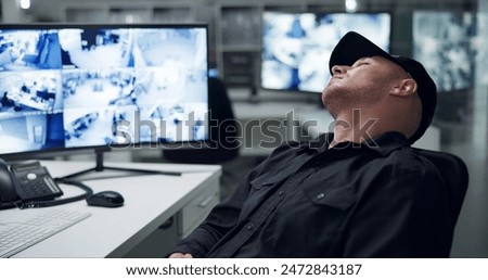 Security guard, computer screen and tired by cctv monitor for protection, data center or building safety. Inspection, video surveillance agency and control room with footage, technology and sleeping