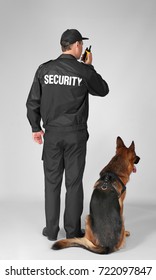 Security Guard With Dog On White Background